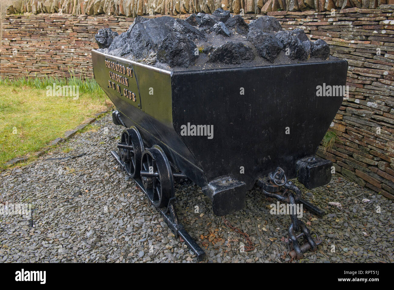 Coal Truck as part of a mining disaster memorial Clydach Vale Rhondda Valley South Wales Stock Photo