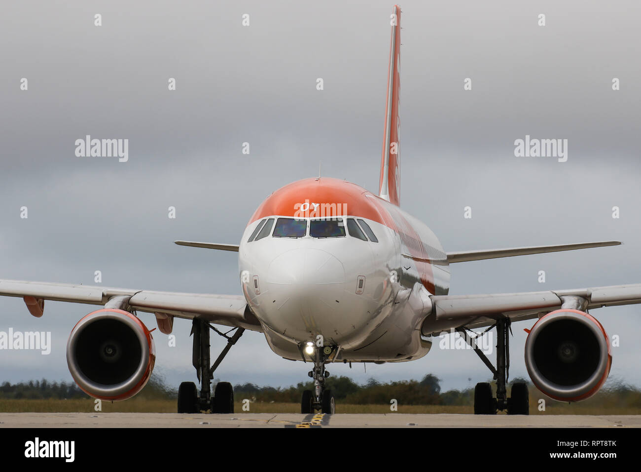 An Airbus A319, operated by easyJet arrives at Jersey Airport Stock Photo