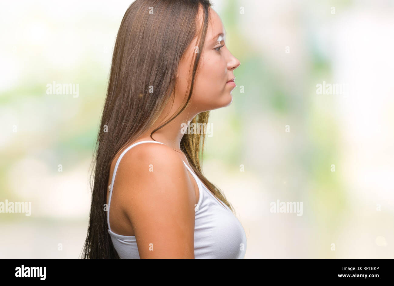 Young caucasian beautiful woman over isolated background looking to ...