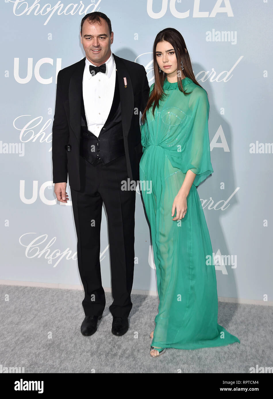 LOS ANGELES, CA - FEBRUARY 21: Milutin Gatsby (L) and Helena Gatsby arrive at the Hollywood For Science Gala at Private Residence on February 21, 2019 Stock Photo