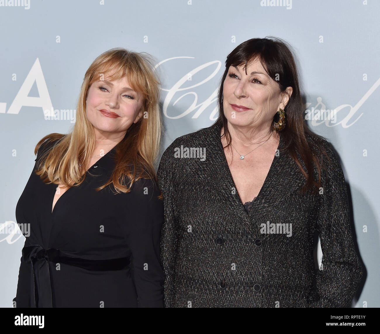 LOS ANGELES, CA - FEBRUARY 21: Rebecca De Mornay (L) and Anjelica Huston arrive at the Hollywood For Science Gala at Private Residence on February 21, Stock Photo