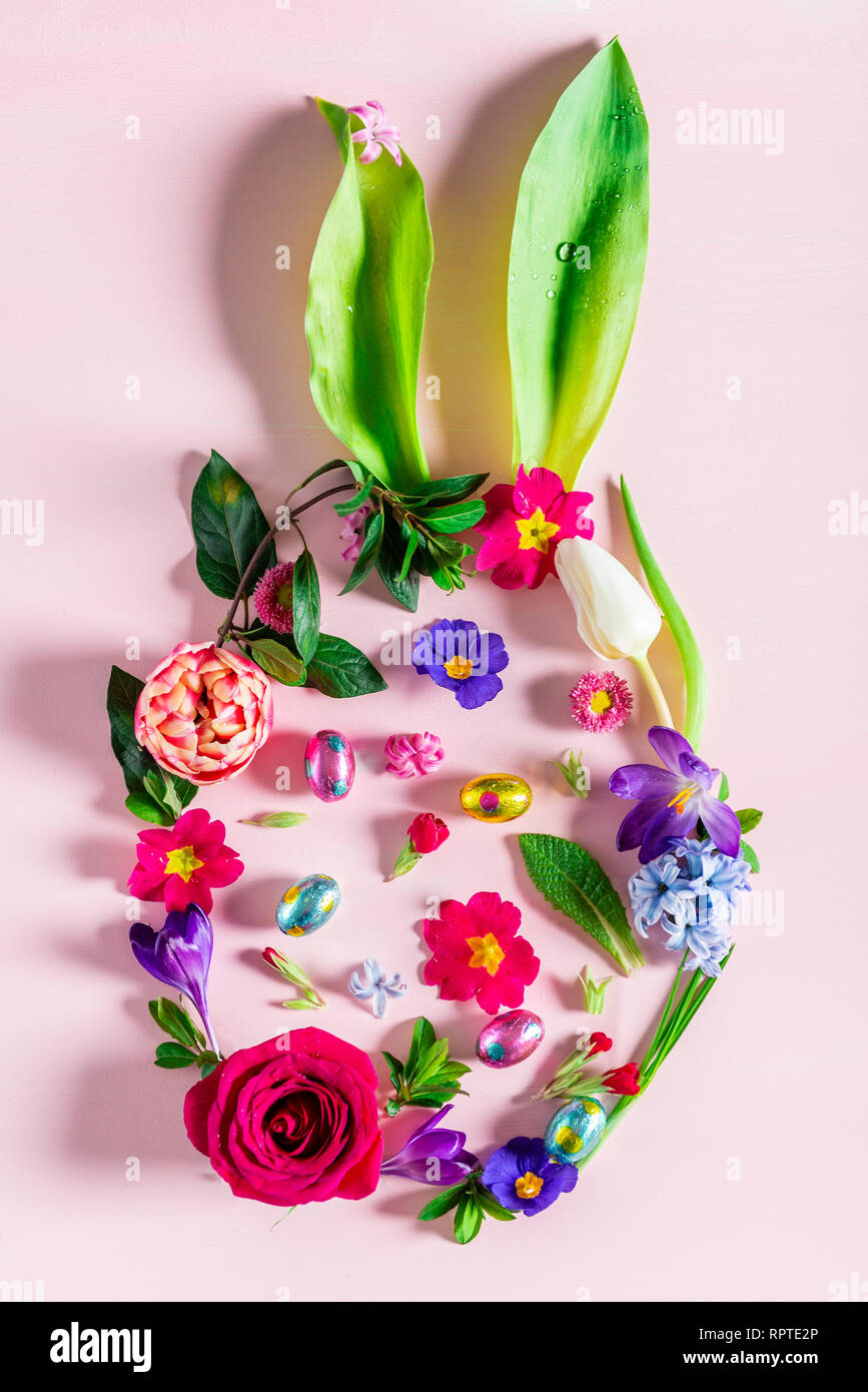 Easter minimal concept. Egg shape with bunny ears made from spring ...