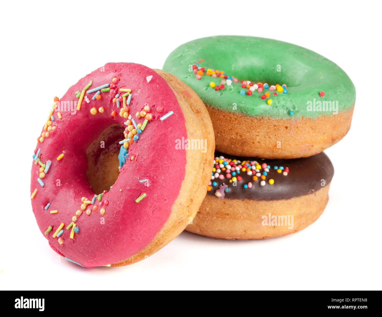 three glazed donut isolated on white background Stock Photo - Alamy