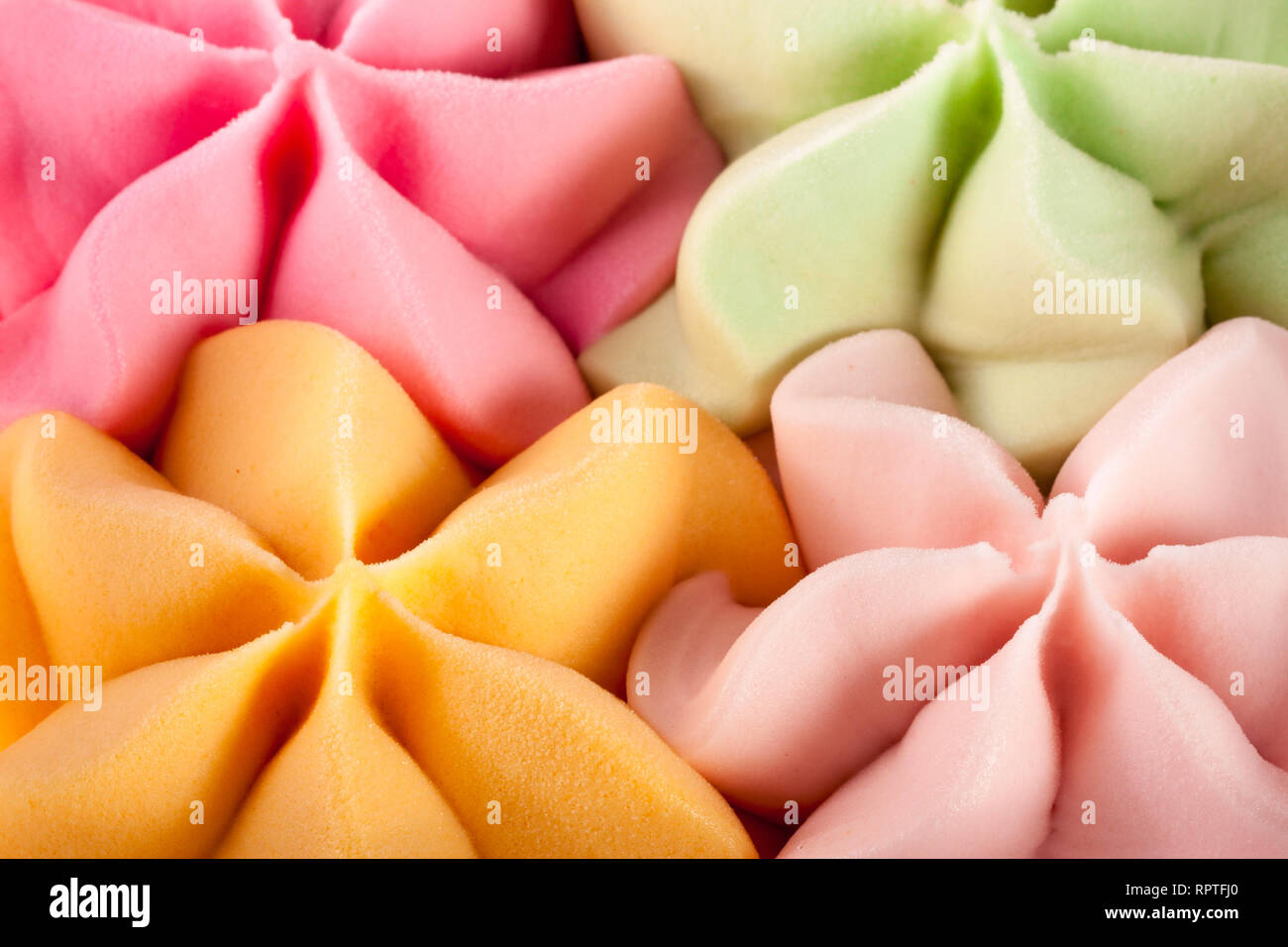 Colorful ice cream in the shape of a flower close-up top view Stock Photo