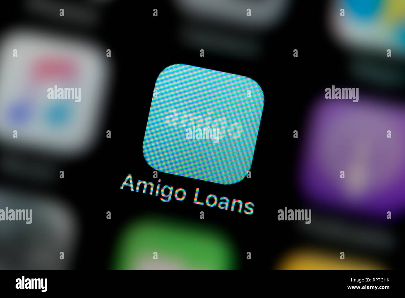 A close-up shot of the Amigo Loans app icon, as seen on the screen of a smart phone (Editorial use only) Stock Photo