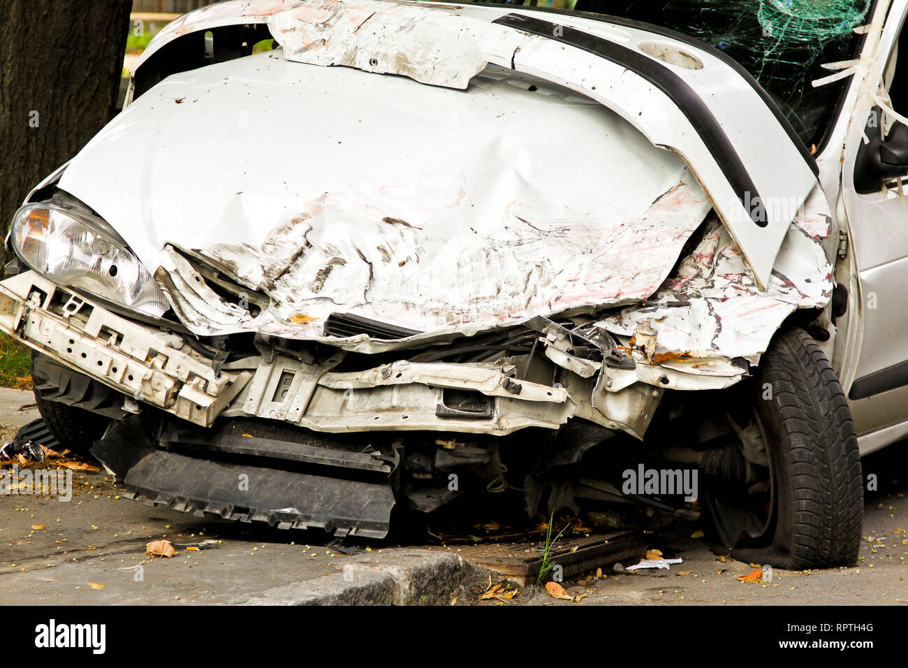 Fatal traffic accident with total damage of white car Stock Photo