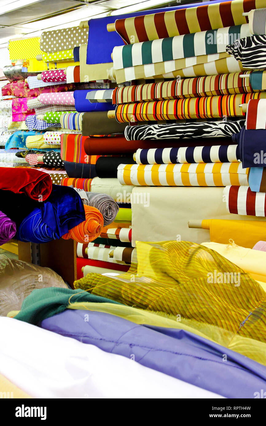 Textile fabric rolls for fashion clothing industry Stock Photo - Alamy