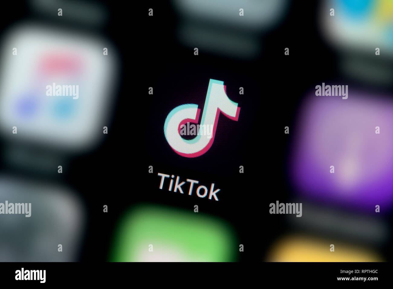 A close-up shot of the TikTok app icon, as seen on the screen of a smart phone (Editorial use only) Stock Photo