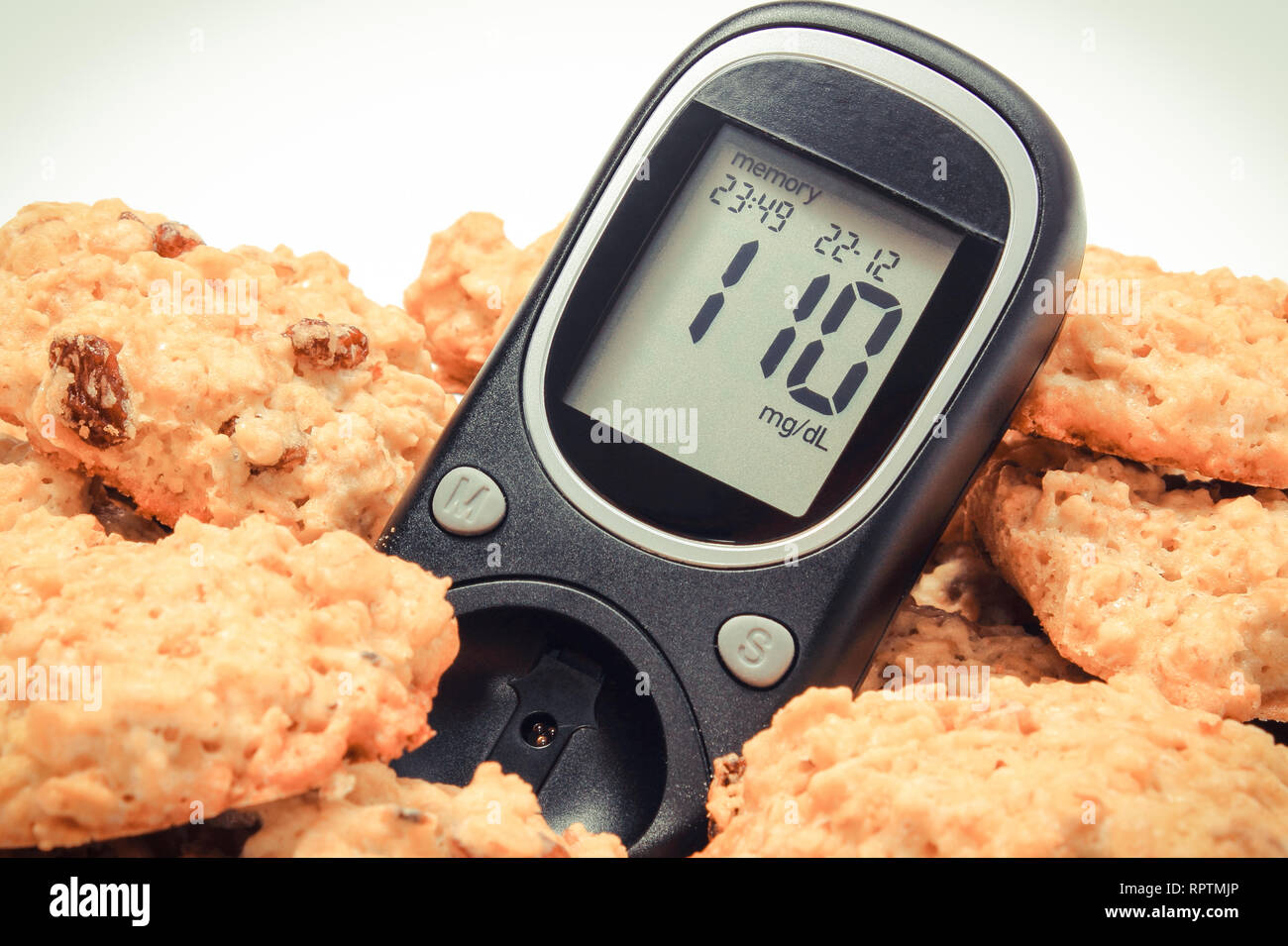 Glucose Meter With Result Of Measurement Sugar Level And Oatmeal Cookies Concept Of Diabetes And Healthy Nutrition Stock Photo Alamy