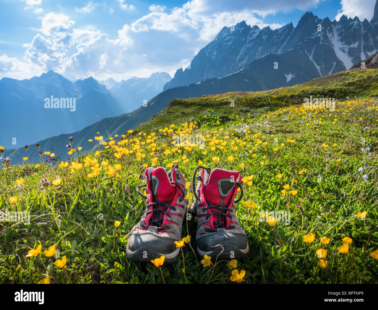 hiking boots and mountains landscape Stock Photo