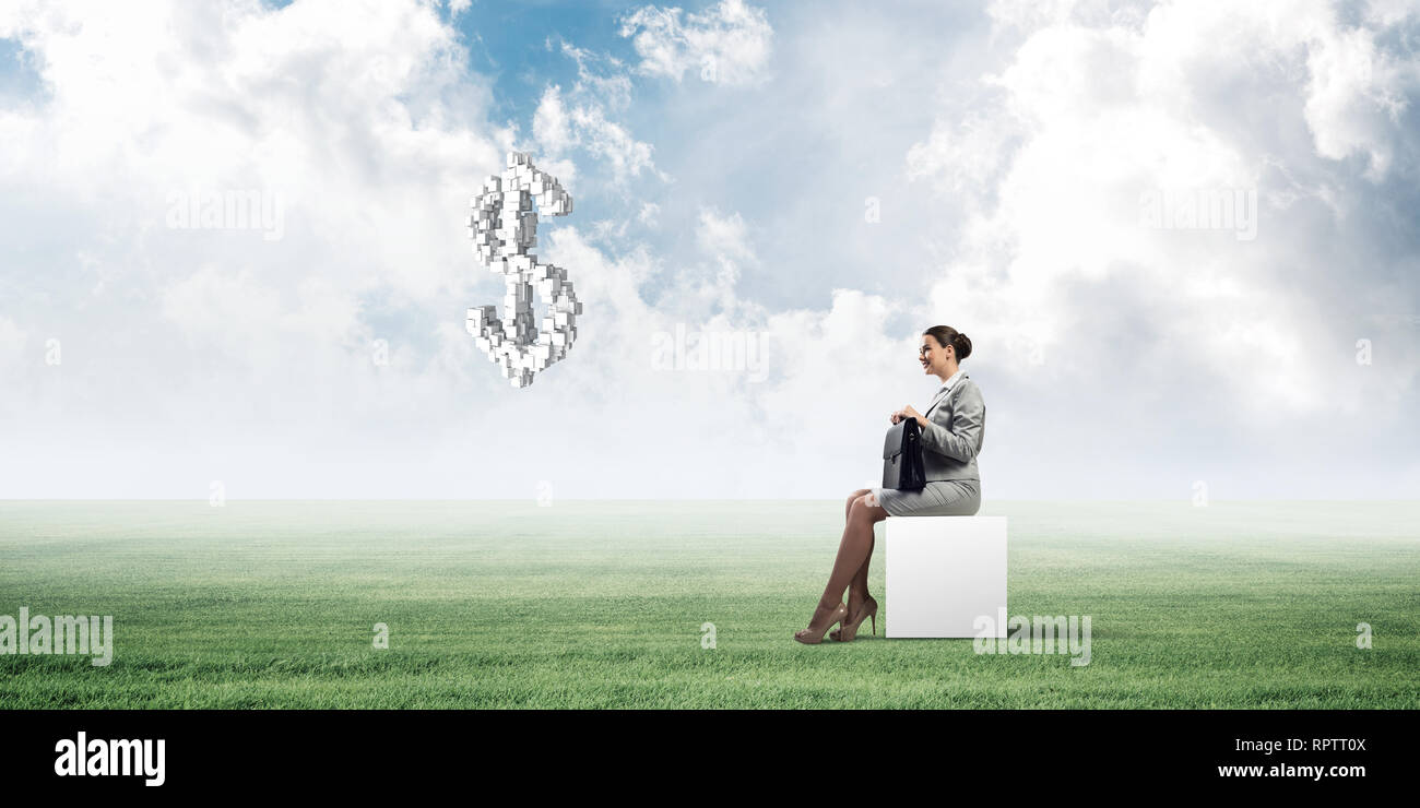 Elegant businesswoman with suitcase in hand sitting on white cube and ...