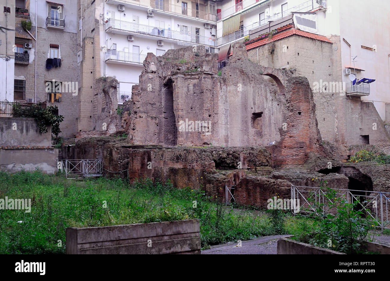 Near the Duomo of Naples there is the archaeological complex of Vico Carminiello ai Mannesi. It brought to light by the bombings of 1943, which destroyed the Church of Santa Maria del Carmine at Mannesi and adjacent buildings, documents part of an insula (isolated) of the ancient city also occupied by a small thermal building. This is a multi-layered construction, quite articulated, dating from its main structures at the end of the first century AD, but which presents elements attributable to different phases, the oldest of which belong to the Republican age. Stock Photo