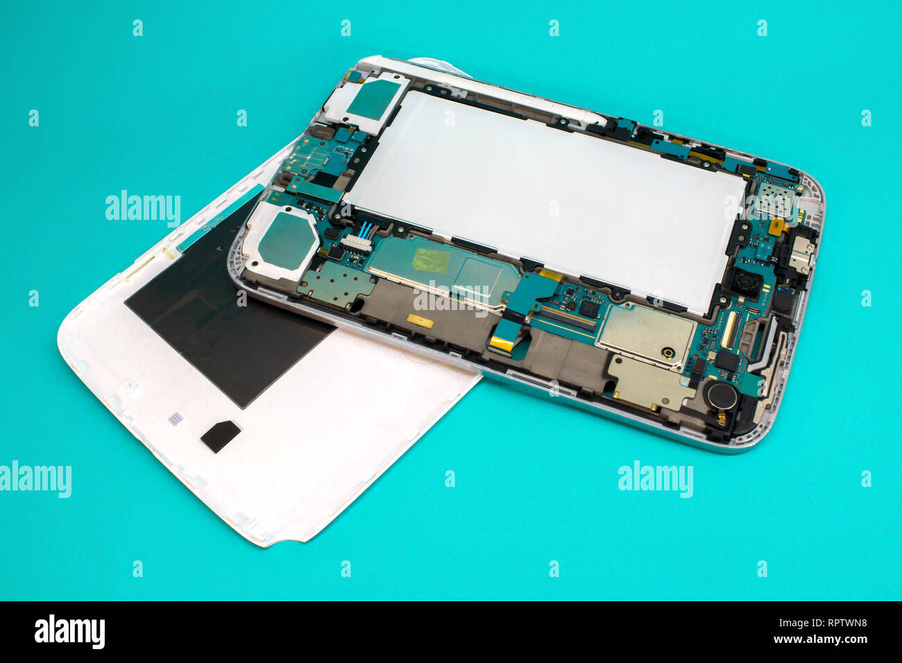 Close-up photos of disassembled mobile phone tablet. Tablet repair spare  parts Stock Photo - Alamy