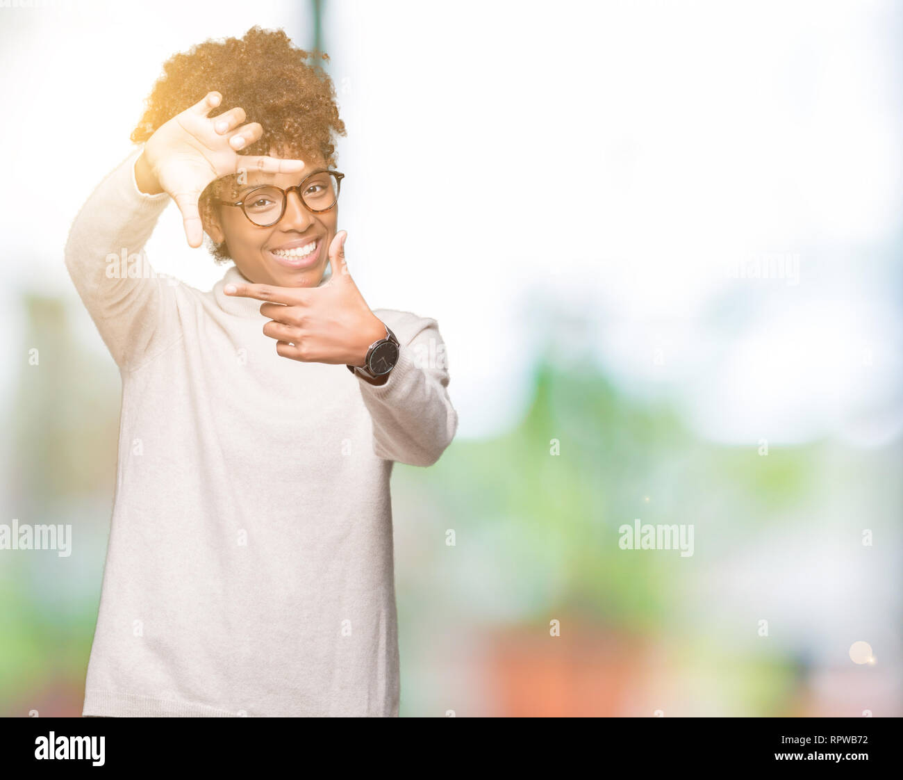 Beautiful young african american woman wearing glasses over isolated ...
