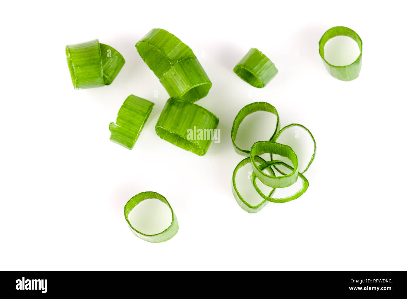 Chopped fresh green onions isolated on white background. Top view Stock ...
