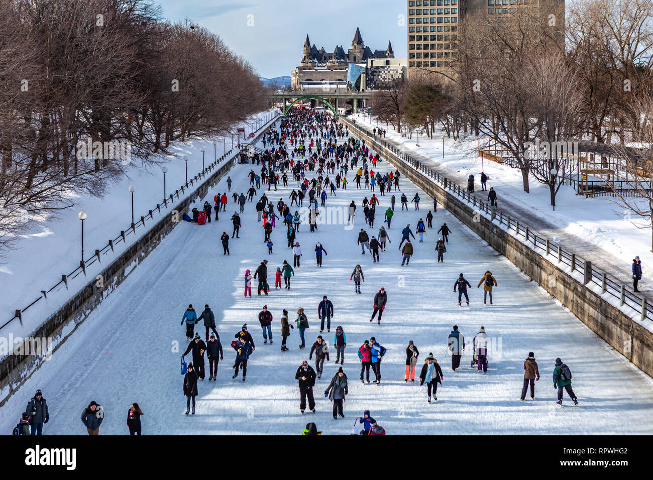 People celebrate the Winterlude festival on the frozen Rideau Canal