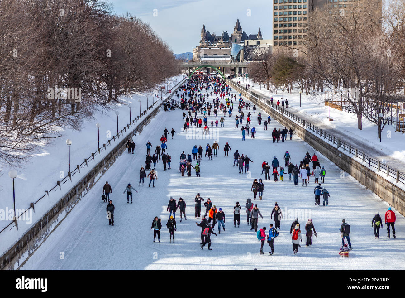 People celebrate the Winterlude festival on the frozen Rideau Canal