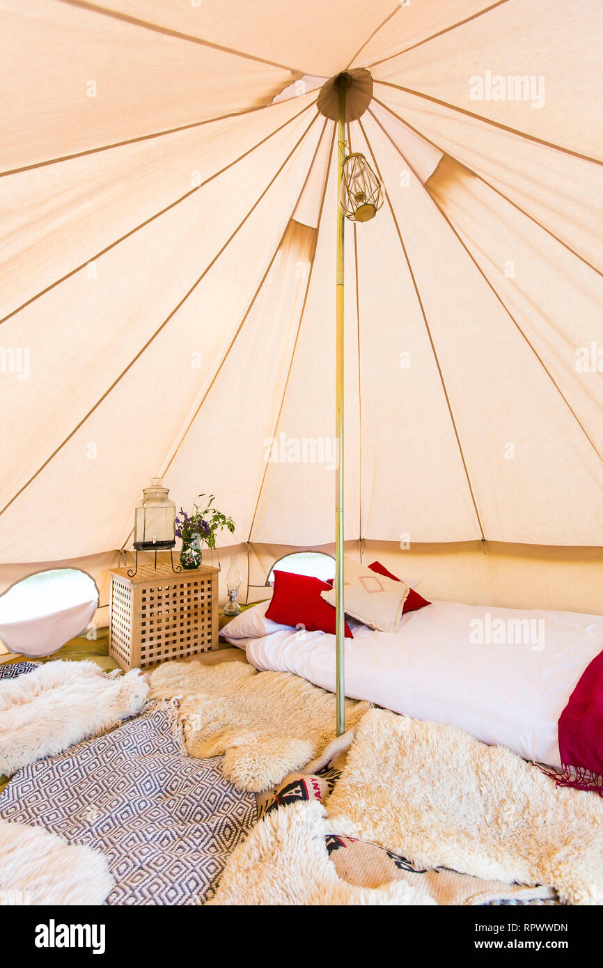 Luxury glamping bell tent interior, Kent, UK Stock Photo