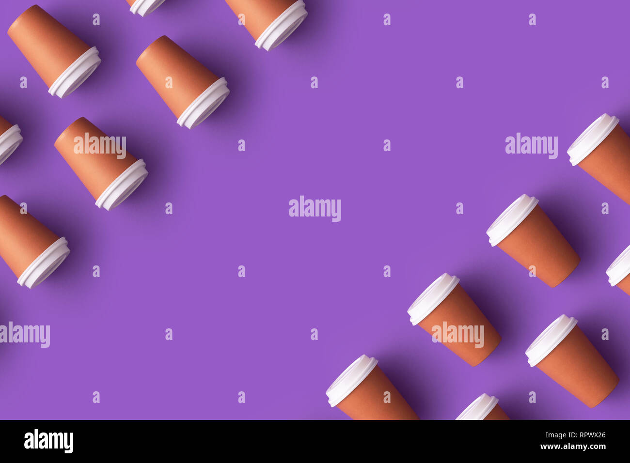 Multiple disposable coffee cups organized over purple background with copy space Stock Photo Alamy