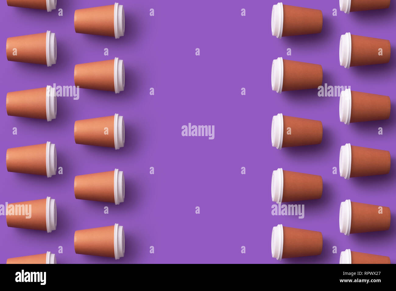 Multiple disposable coffee cups organized over purple background with copy space Stock Photo Alamy