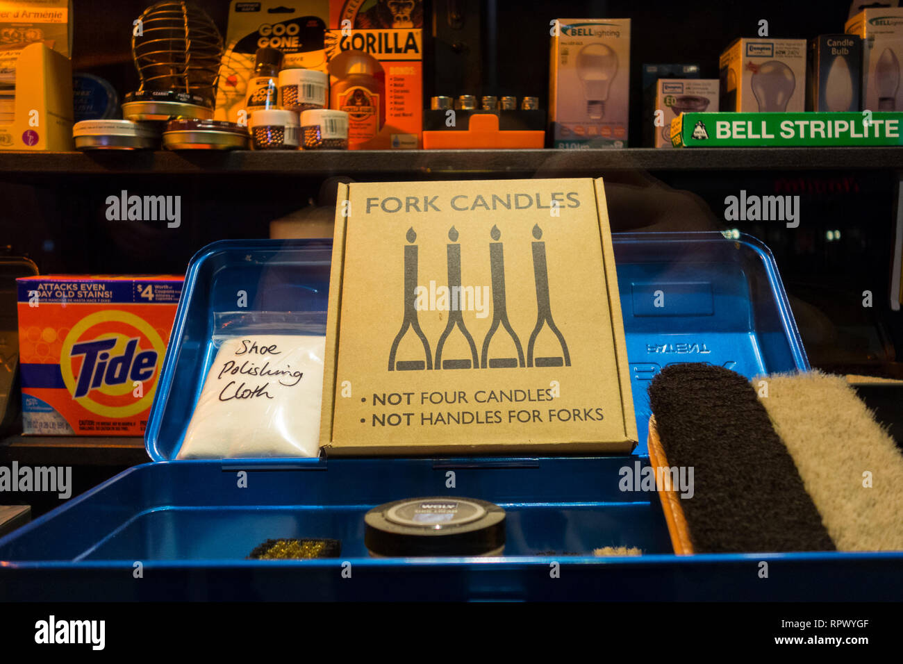 Fork Candles cardboard box and packaging in an ironmongers shop window Stock Photo