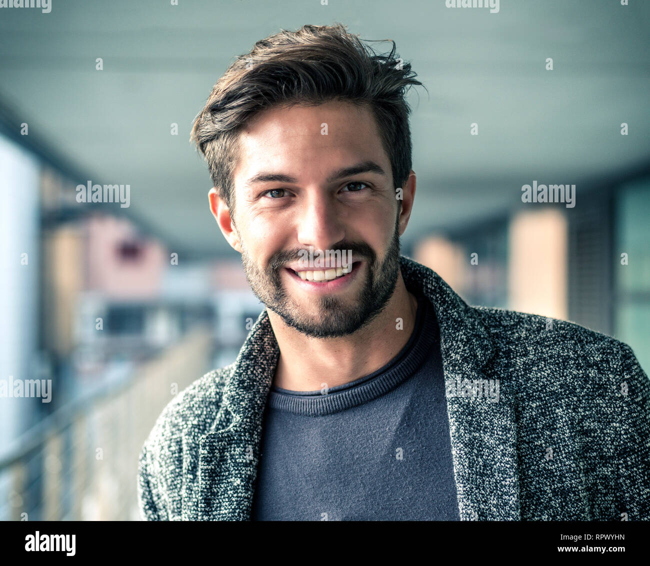 Premium Photo  Ready to play. handsome young man holding american