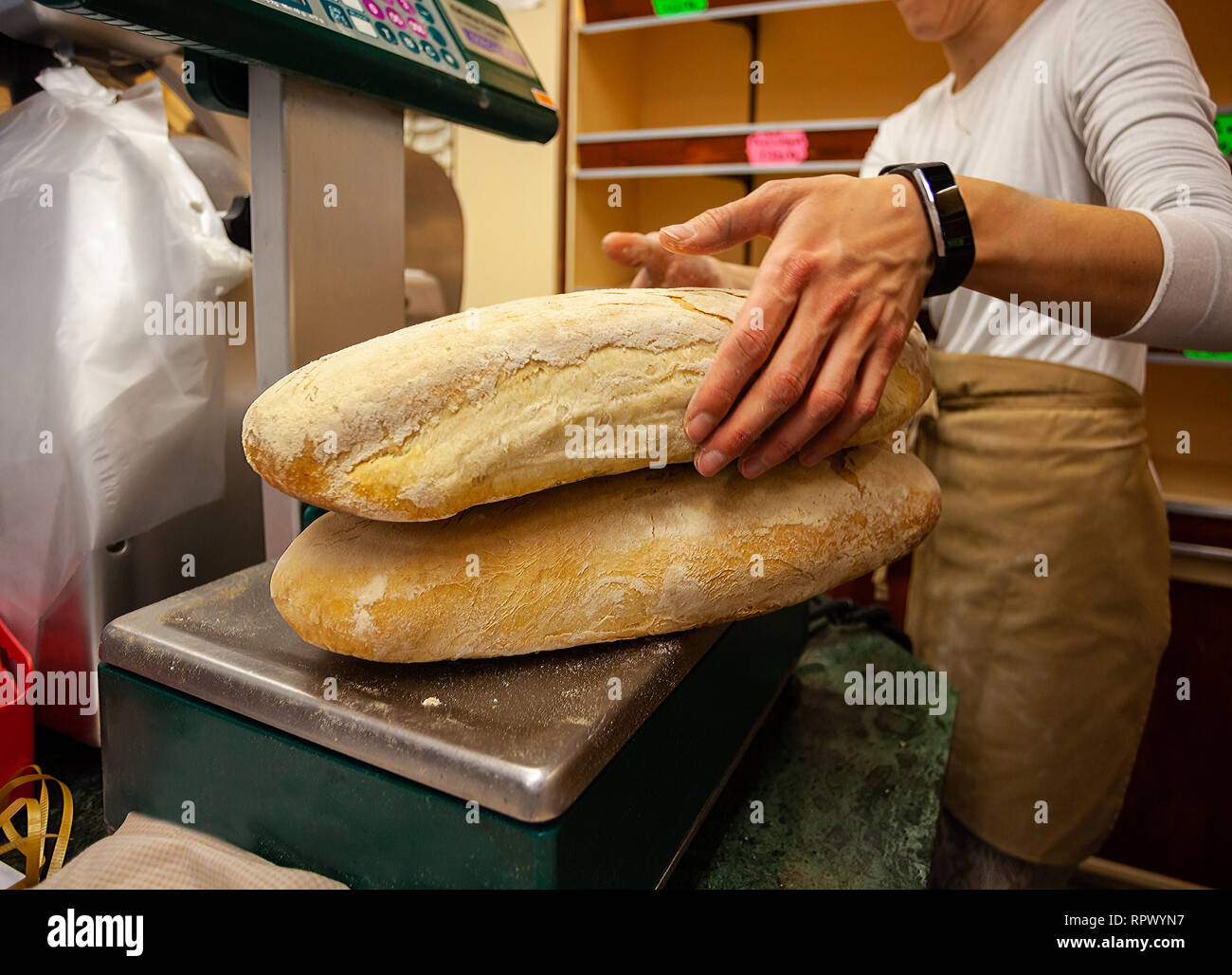 The Weight Of Bread Loaf Of Bread On The Scales Stock Photo, Picture and  Royalty Free Image. Image 59289355.