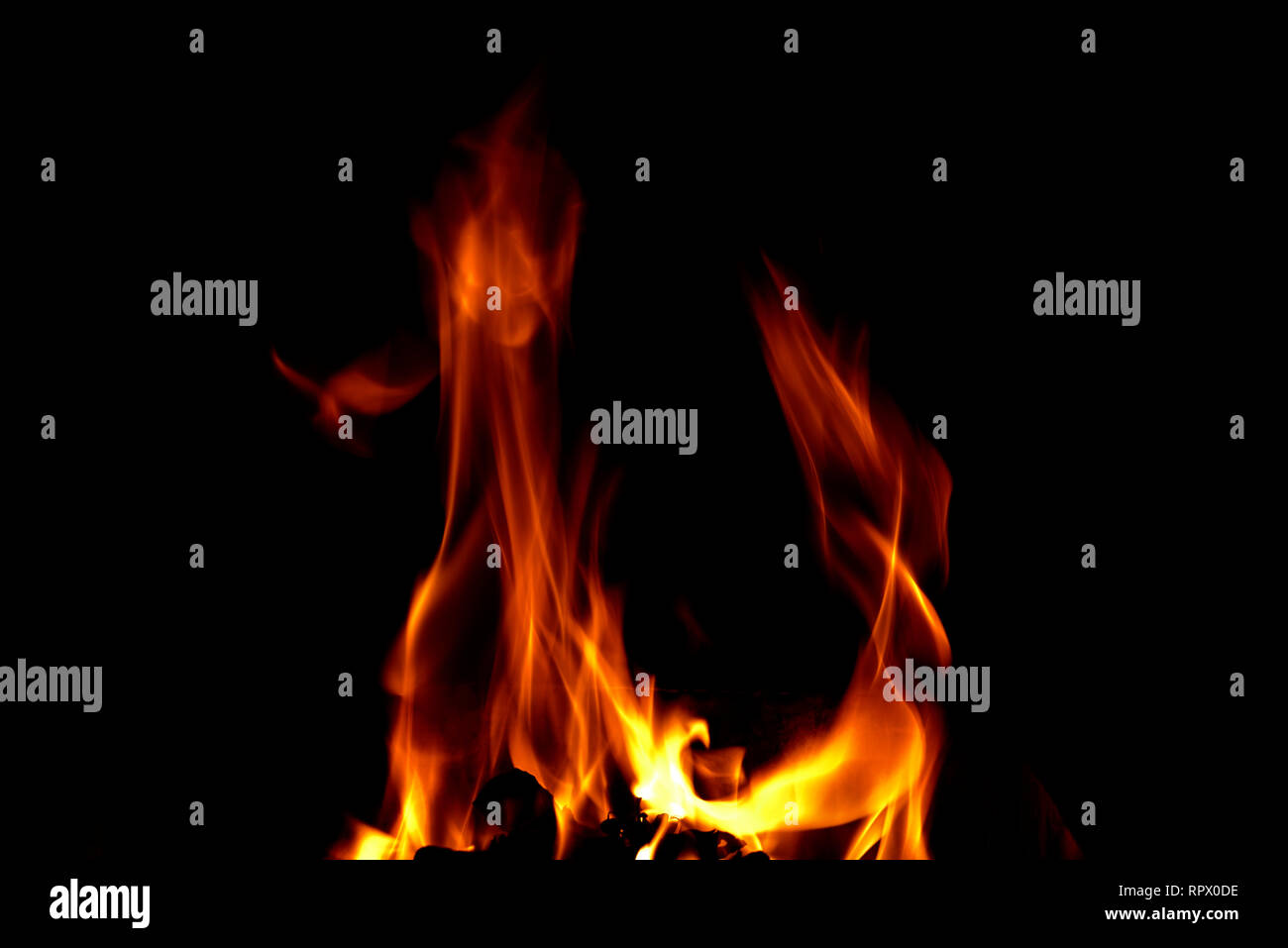Fire flame isolated on black background Stock Photo - Alamy