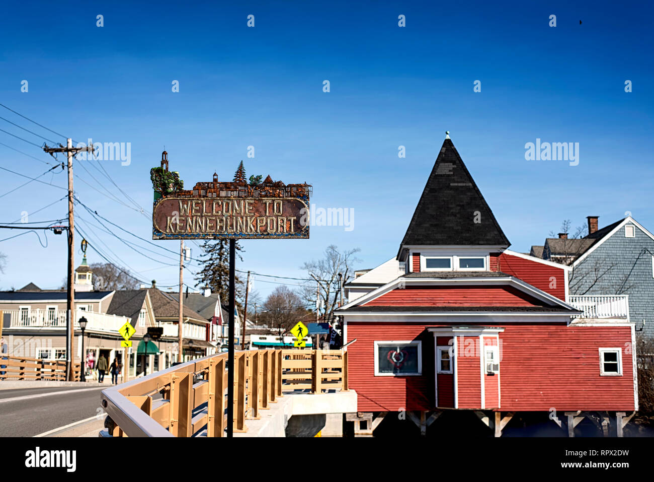 The Kennebunkport sign located on a bridge crossing the Batson River on a cold sunny winter day