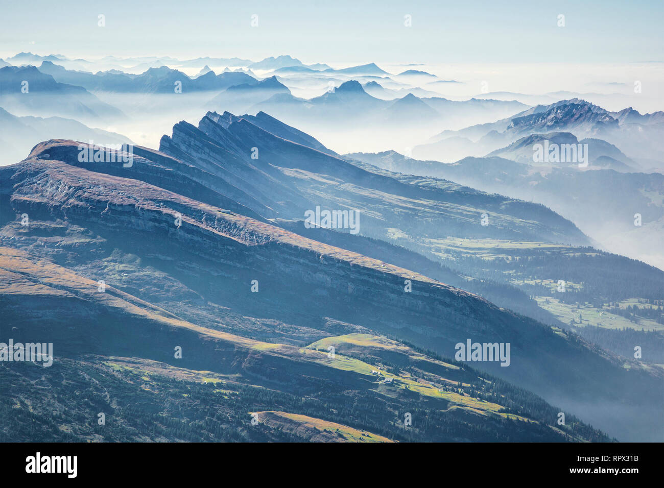 Alpine landscape in the mist, Switzerland Stock Photo