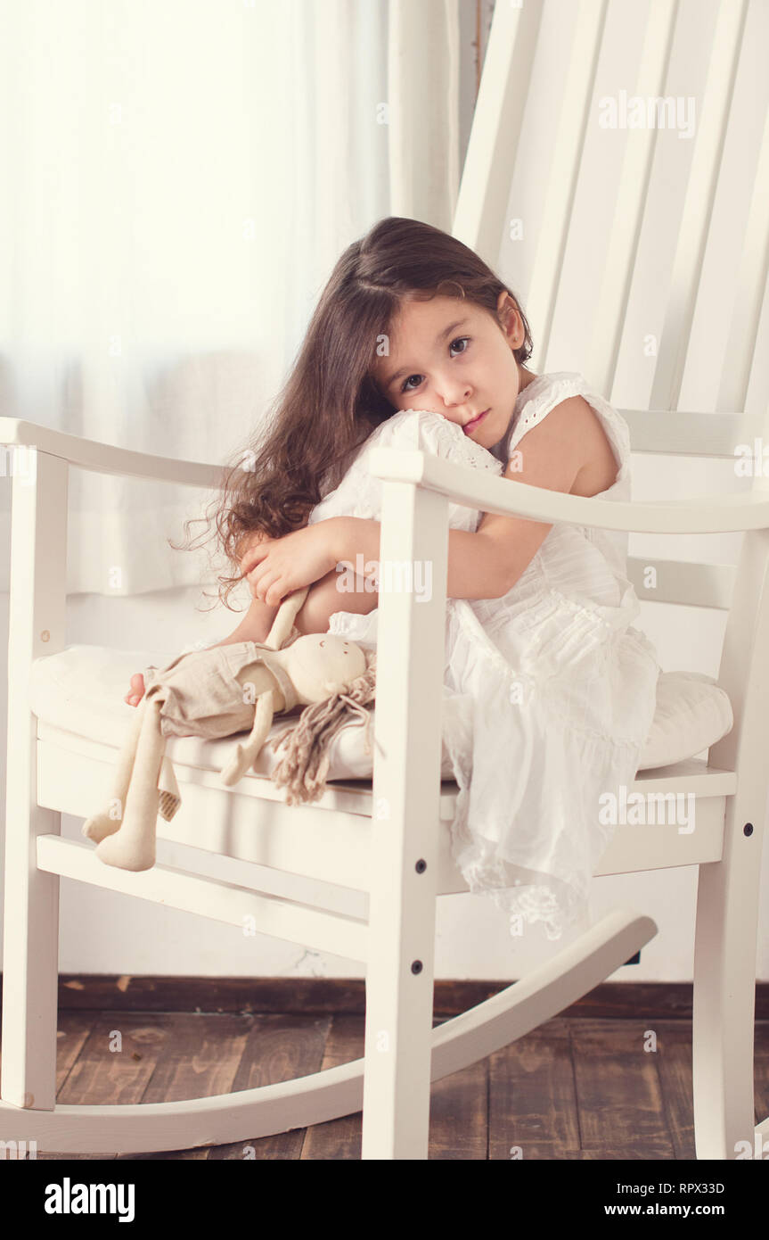 Girl sitting chair doll hi-res stock photography and images - Alamy