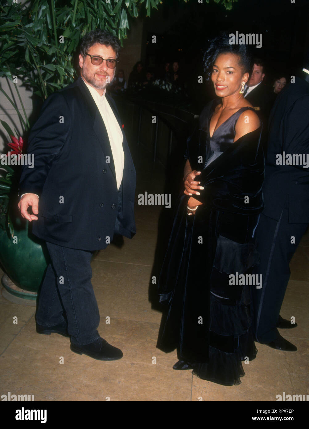 BEVERLY HILLS, CA - JANUARY 22: Manager Barry Krost and actress Angela Bassett attend the 51st Annual Golden Globe Awards on January 22, 1994 at the Beverly Hilton Hotel in Beverly Hills, California. Photo by Barry King/Alamy Stock Photo Stock Photo