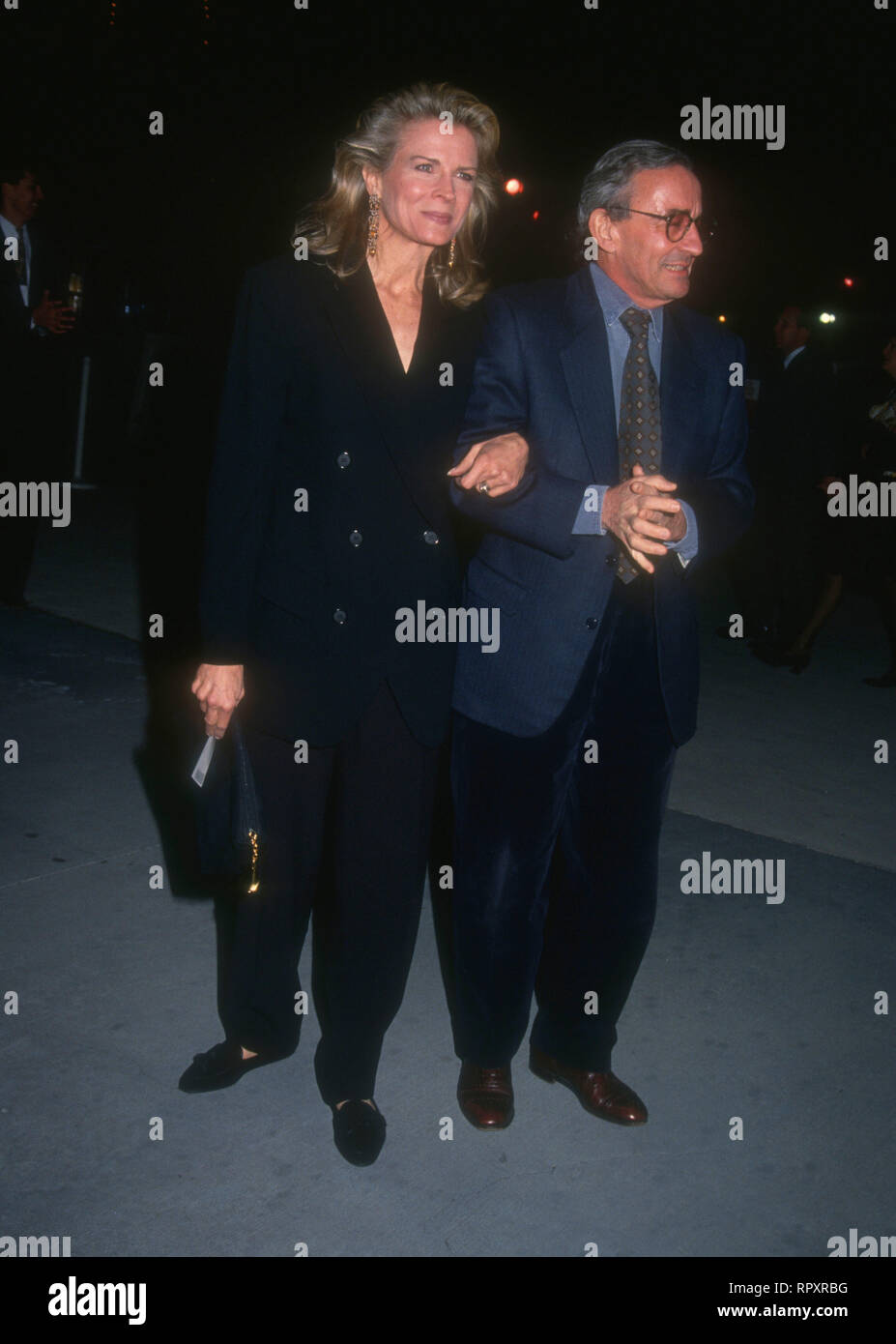 UNIVERSAL CITY, CA - JANUARY 27: Actress Candice Bergen and director Louis Malle attend APLA Commitment to Life VII Benefit on January 27, 1994 at Universal Studios in Universal City, California. Photo by Barry King/Alamy Stock Photo Stock Photo