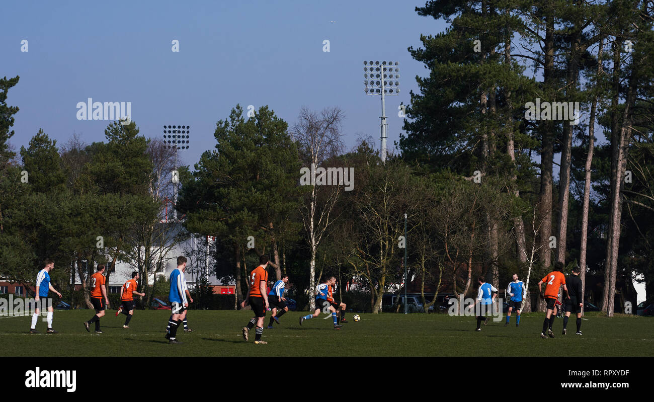 Saturday morning football matches taking place as the floodlights of the  Vitality Stadium overlook them before the Premier League match at the  Vitality Stadium, Bournemouth Stock Photo - Alamy