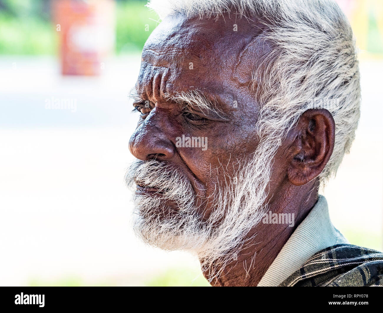 PUDUCHERY, INDIA - DECEMBER Circa, 2018. An unidentifed old senior indian  poor man portrait with a dark brown wrinkled face and white hair and a  white Stock Photo - Alamy