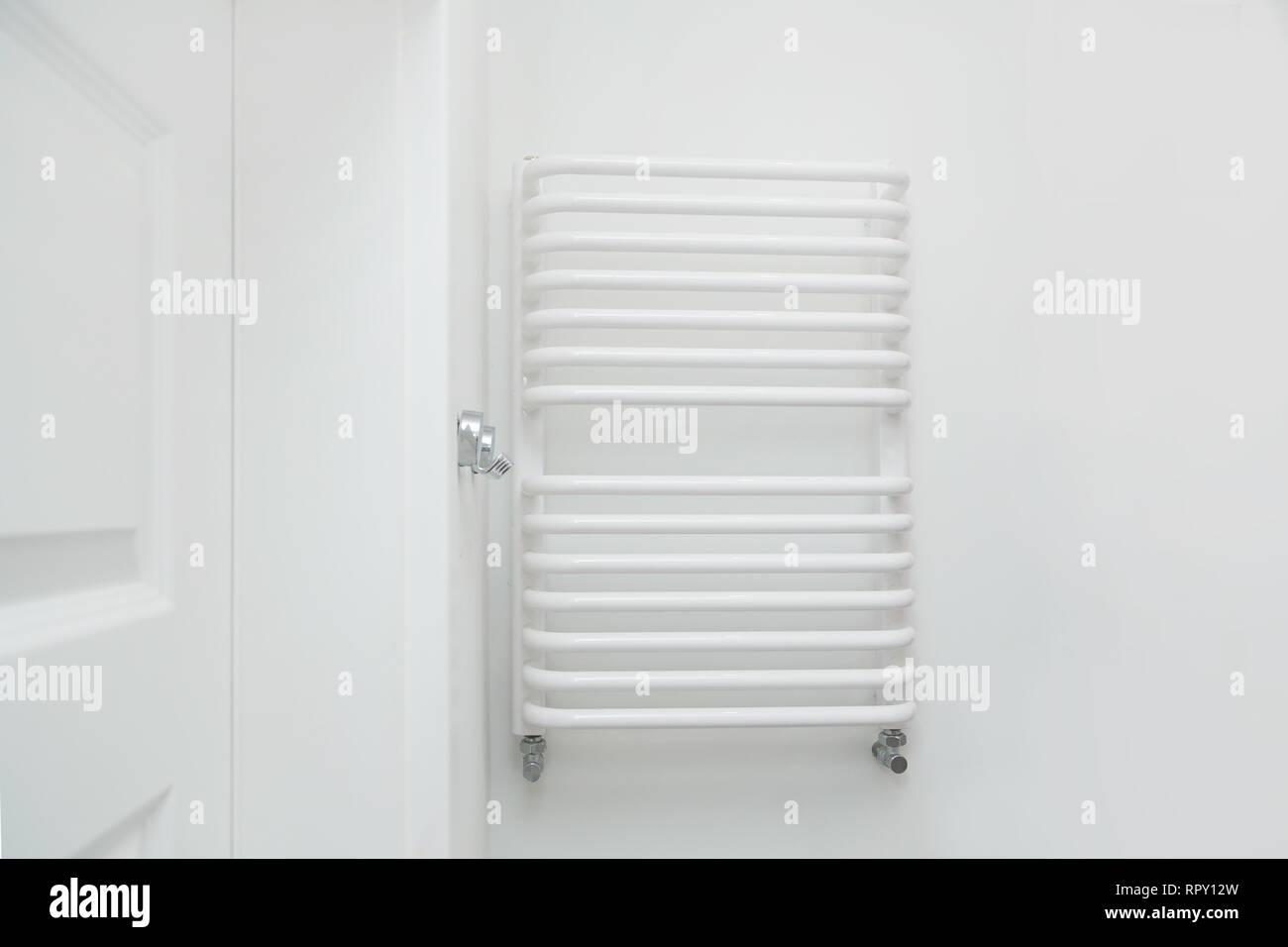 Heating white coil to dry towels Stock Photo Alamy