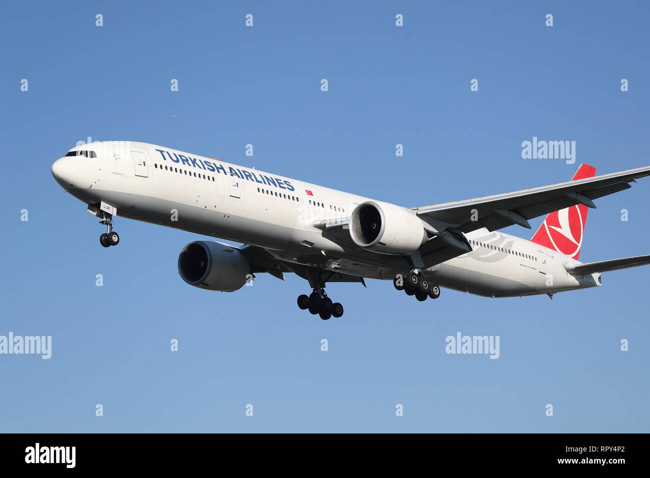 Turkish Airlines Boeing 777 TC-JJN landing at London Heathrow Airport, UK Stock Photo