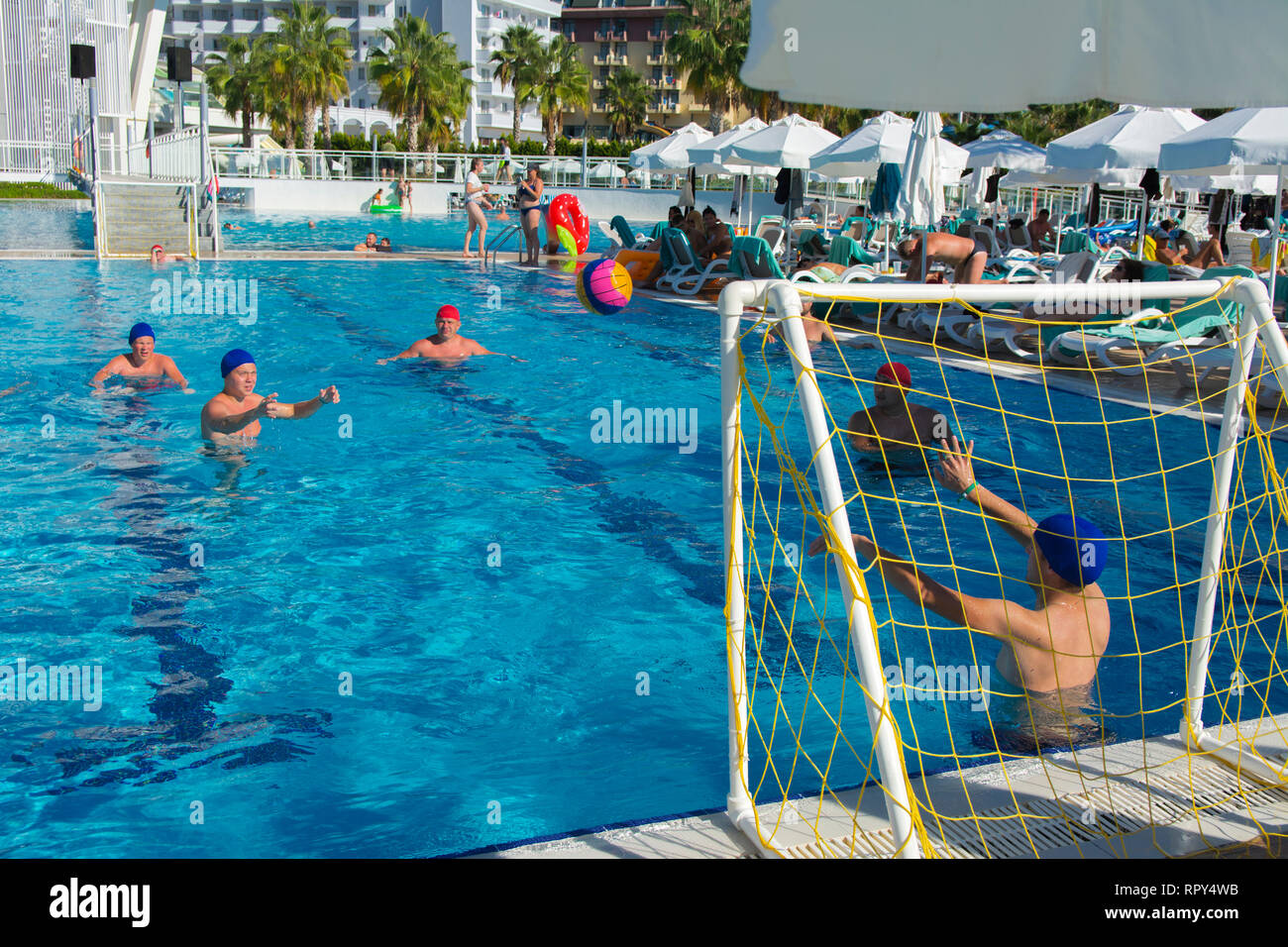 Alanya, Turkey - October 05, 2018. A group of people plays water polo in  the blue clear water of the Kirman Sidera Luxury hotel pool. Fitness  concept Stock Photo - Alamy
