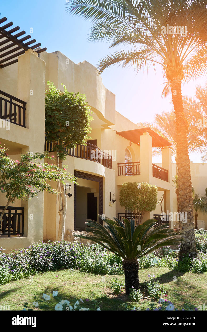 Sharm El Sheikh, Egypt - February 9, 2019: Five-star The Grand Hotel with palms and well-groomed territory. East architecture house in summer Stock Photo