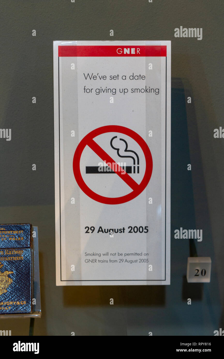 A GNER notice advising customers that smoking on trains is banned from 29 August 2005 on display in the National Railway Museum, York, UK. Stock Photo
