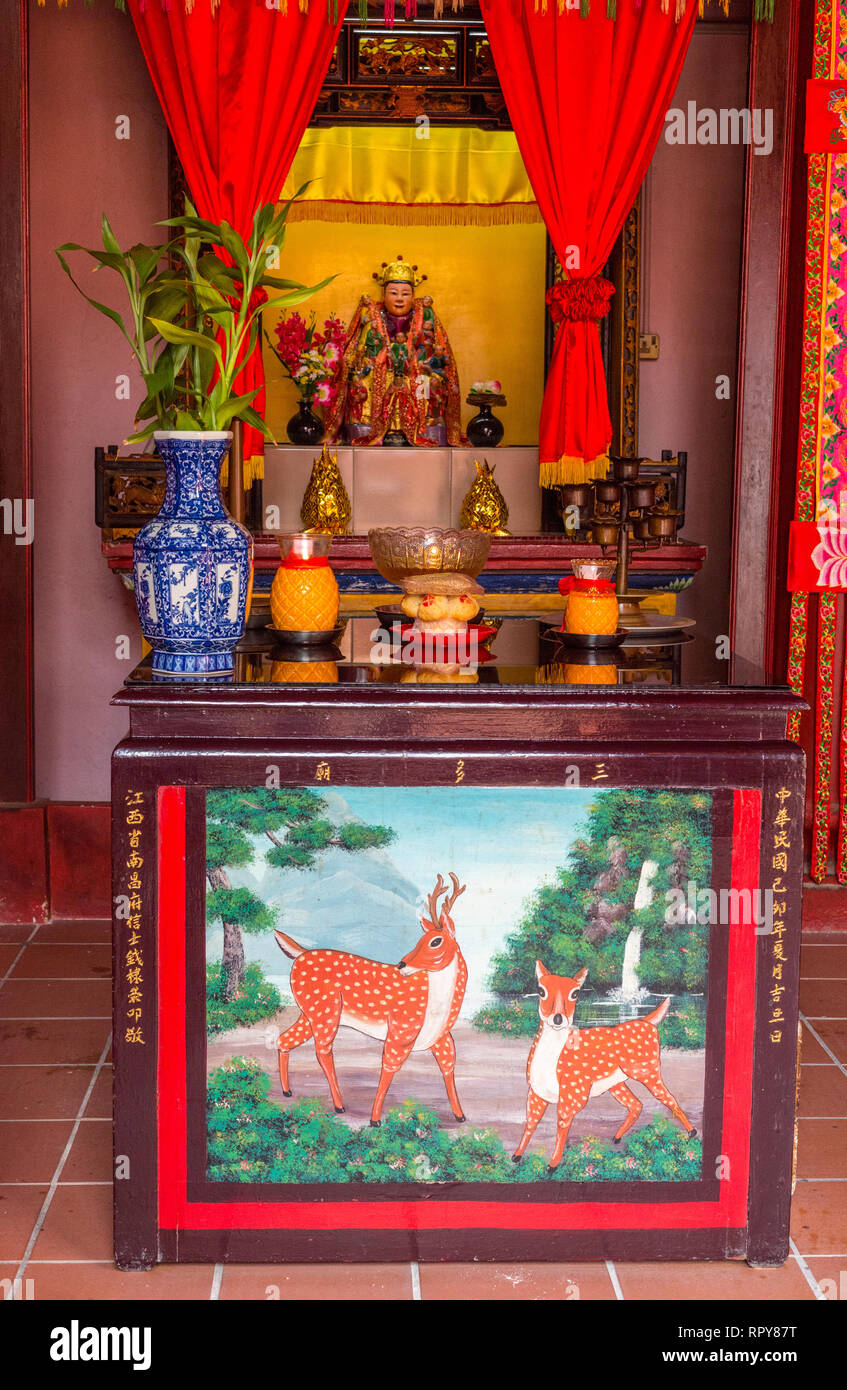 Altar and Deity in the San Duo Chinese Temple, Melaka, Malaysia. Stock Photo