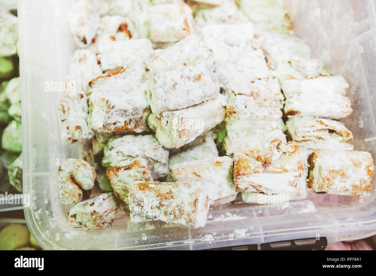 Fresh tasty homemade cookies for sale at food market stand Stock Photo