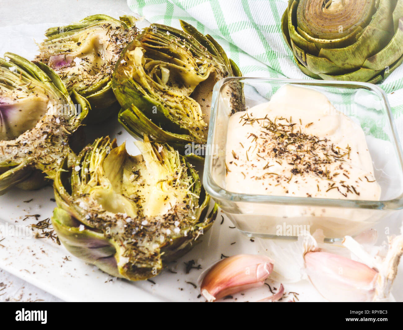 Cooked Arttichokes with Thyme and Mayonnaise Dipping Sauce Stock Photo
