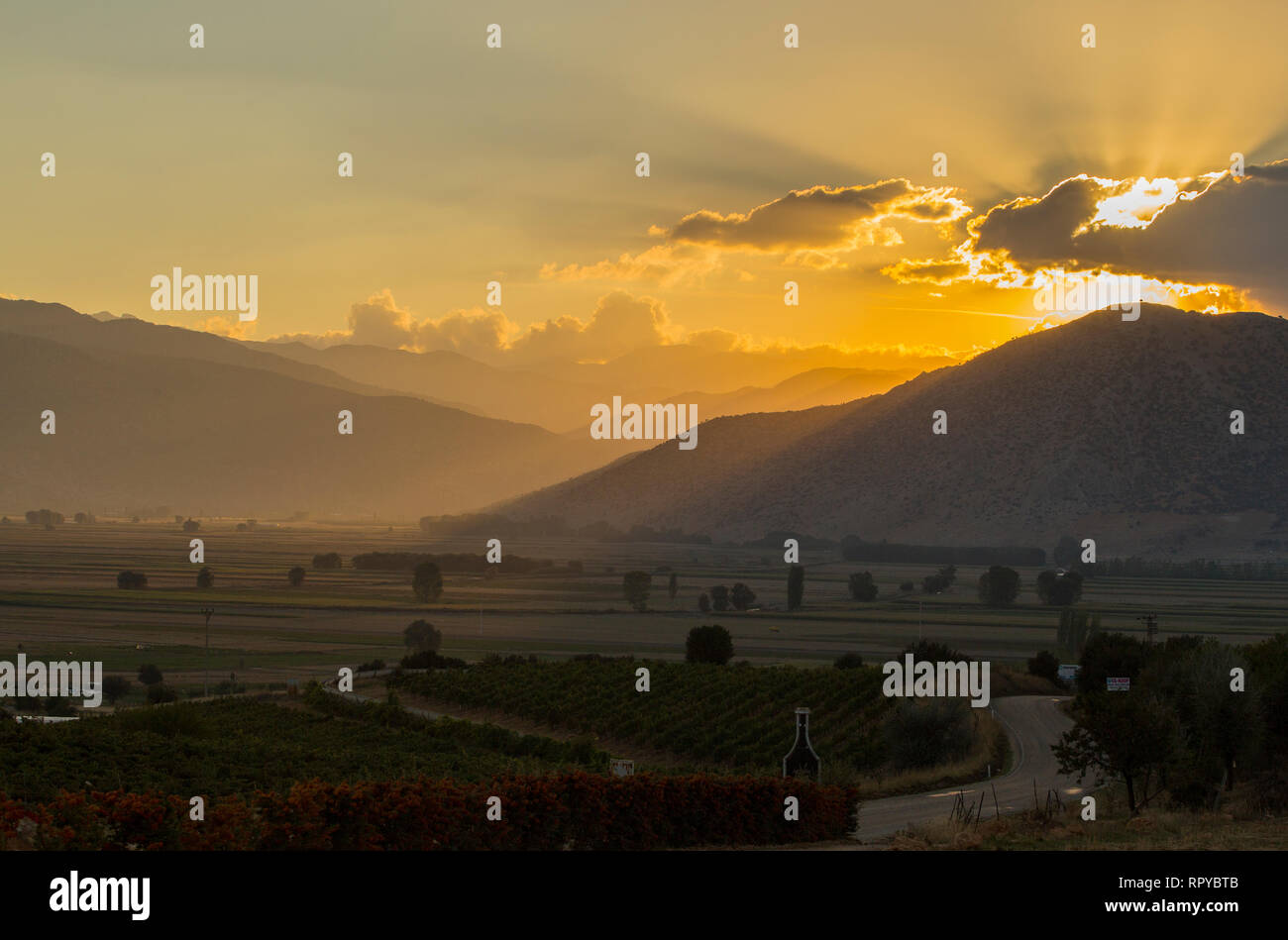 Sunset at Elmali, Antalya with lens flare and high contrast. Happiness, life, joy concepts. With copy space for quotes and text. Stock Photo