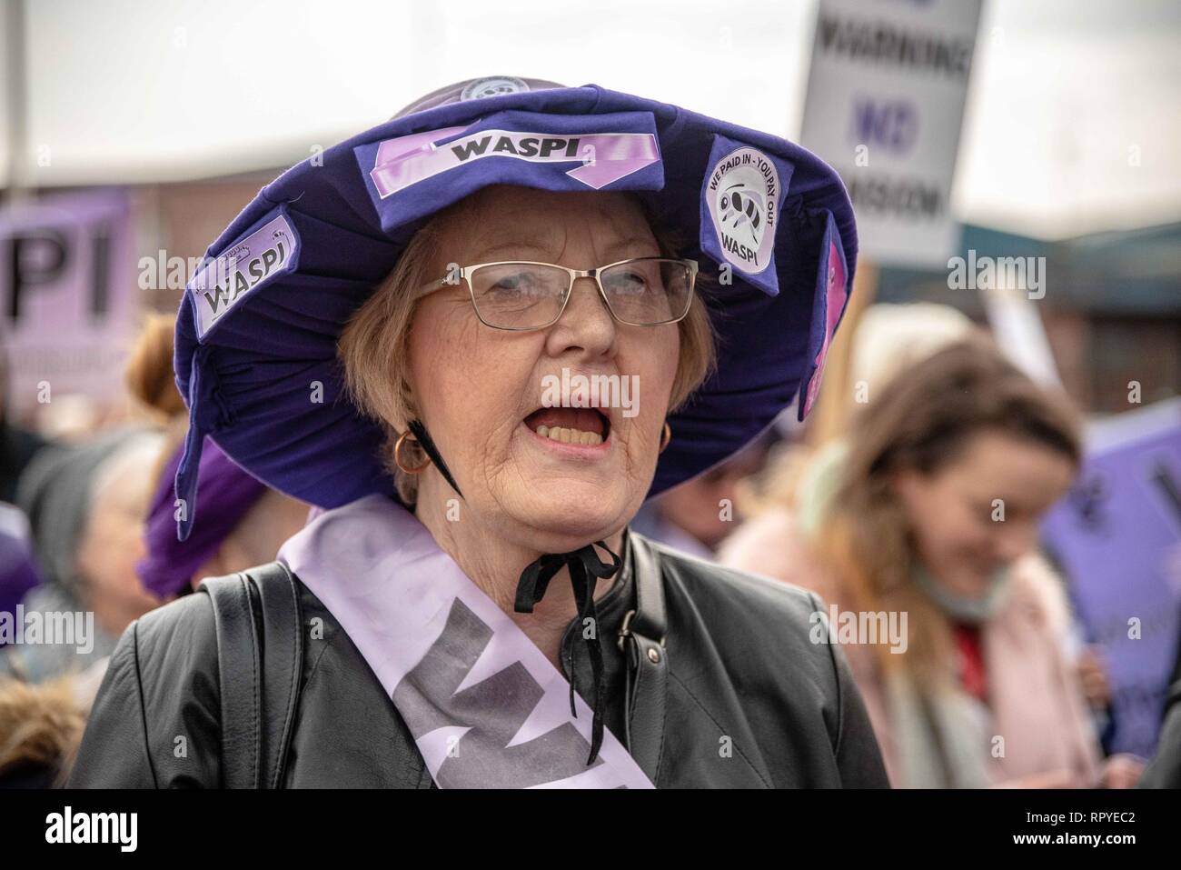 A protester is seen shouting slogans during the demonstration. Protesters from all over Scotland took part in a protest against the changes in the state pension for women. WASPI (Women Against State Pension Injustice) and several other groups took to the streets in protest over it. Stock Photo