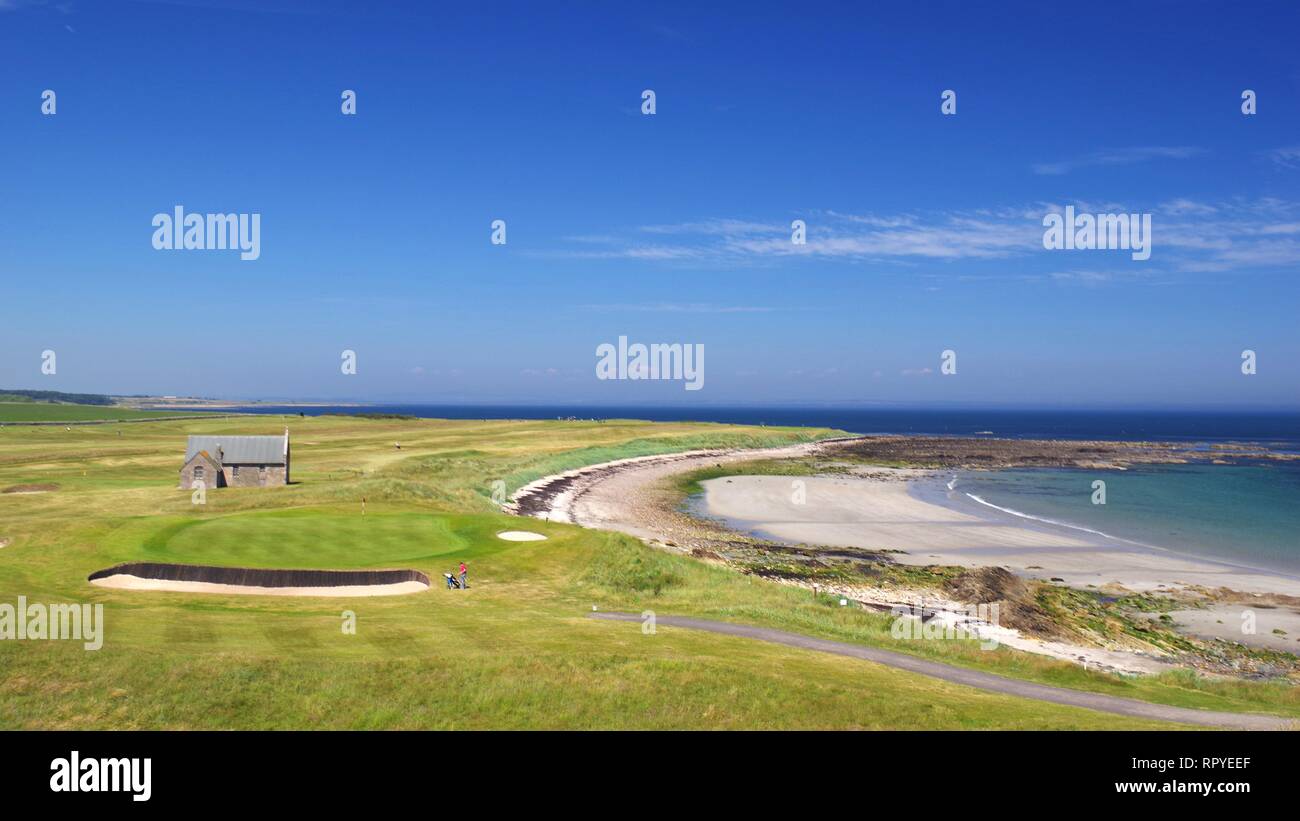 Balcomie Sands Beach and Crail Golf Society on a Sunny Summers Day, Craighead, Fife, Scotland, UK. Stock Photo