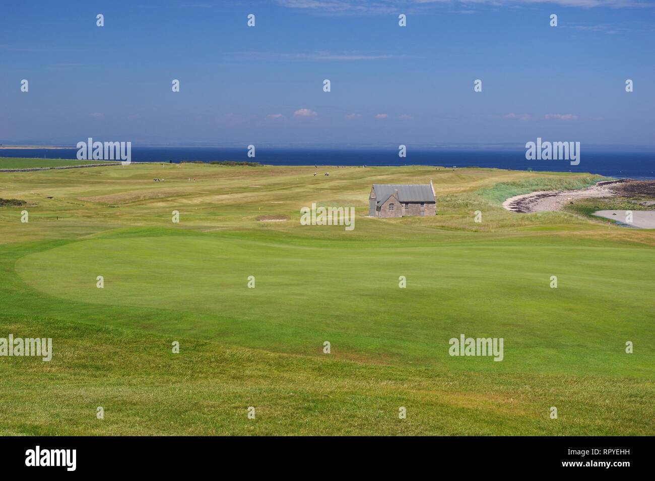 Balcomie Sands Beach and Crail Golf Society on a Sunny Summers Day, Craighead, Fife, Scotland, UK. Stock Photo