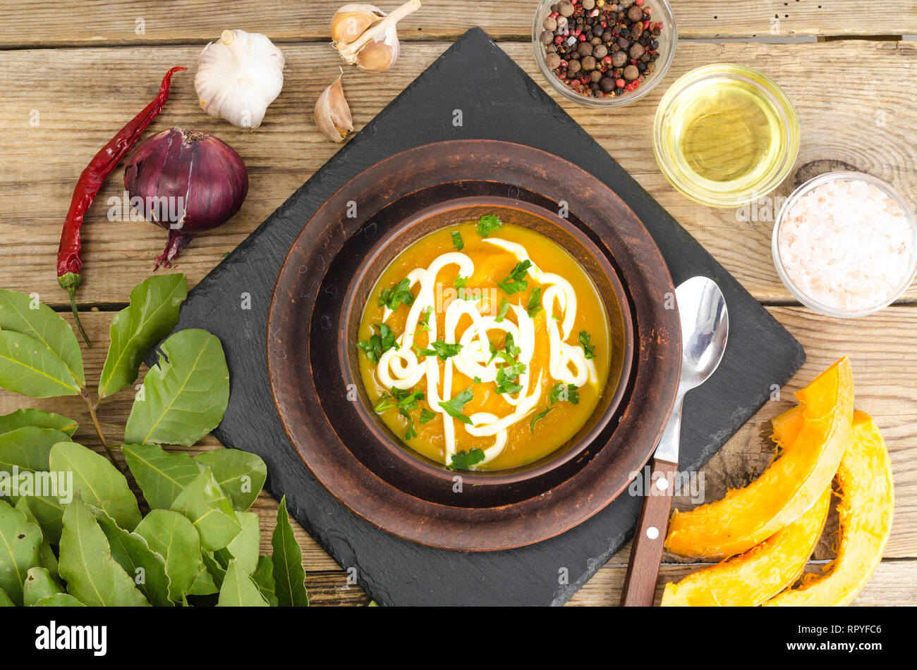 Vegetable puree, vegetarian soup with sour cream and greens. Studio