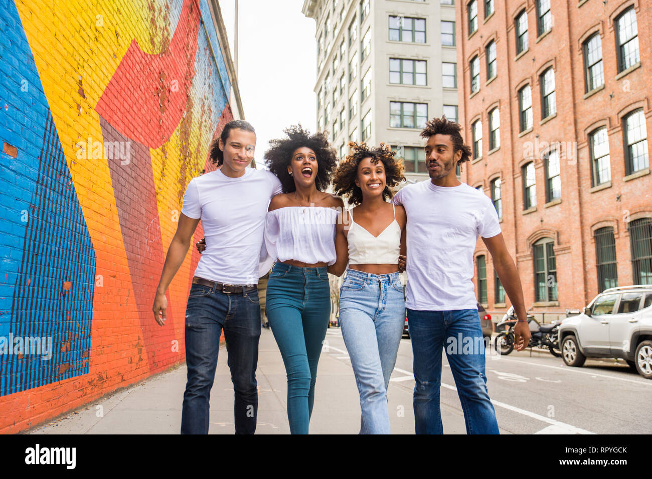 Group of afroamerican friends bonding in Manhattan, New York Young