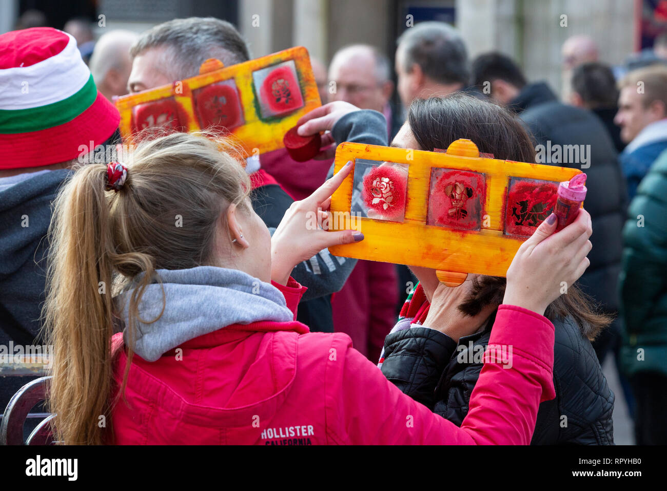Cardiff, Wales, UK. 23rd Feb 2019.  Wales and England rugby supporters gather in Cardiff City centre ahead of the Six Nations match between the two teams. Credit: Gruffydd Thomas/Alamy Live News Stock Photo